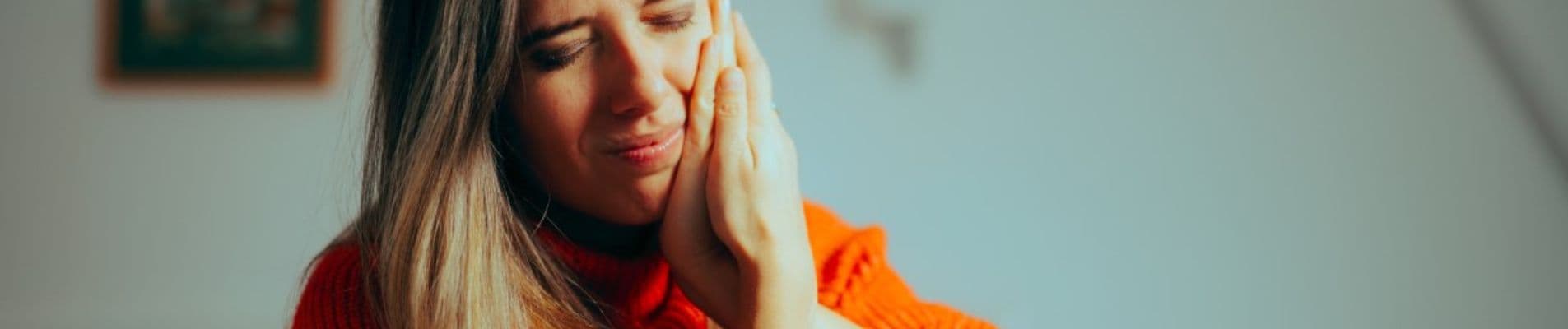 A broken tooth requiring emergency care and a temporary fix before professional dental treatment