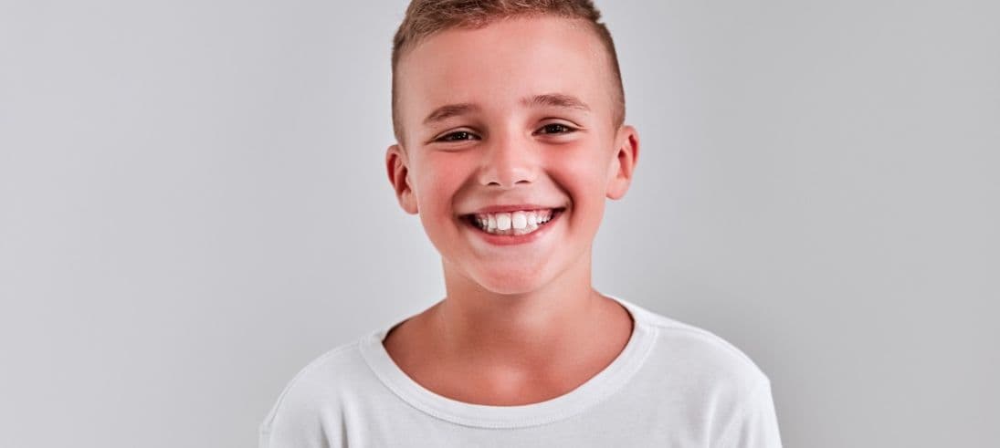 Dental hygienist examining a patient — understanding the scope of diagnosis in UK dentistry — Dental Clinic London